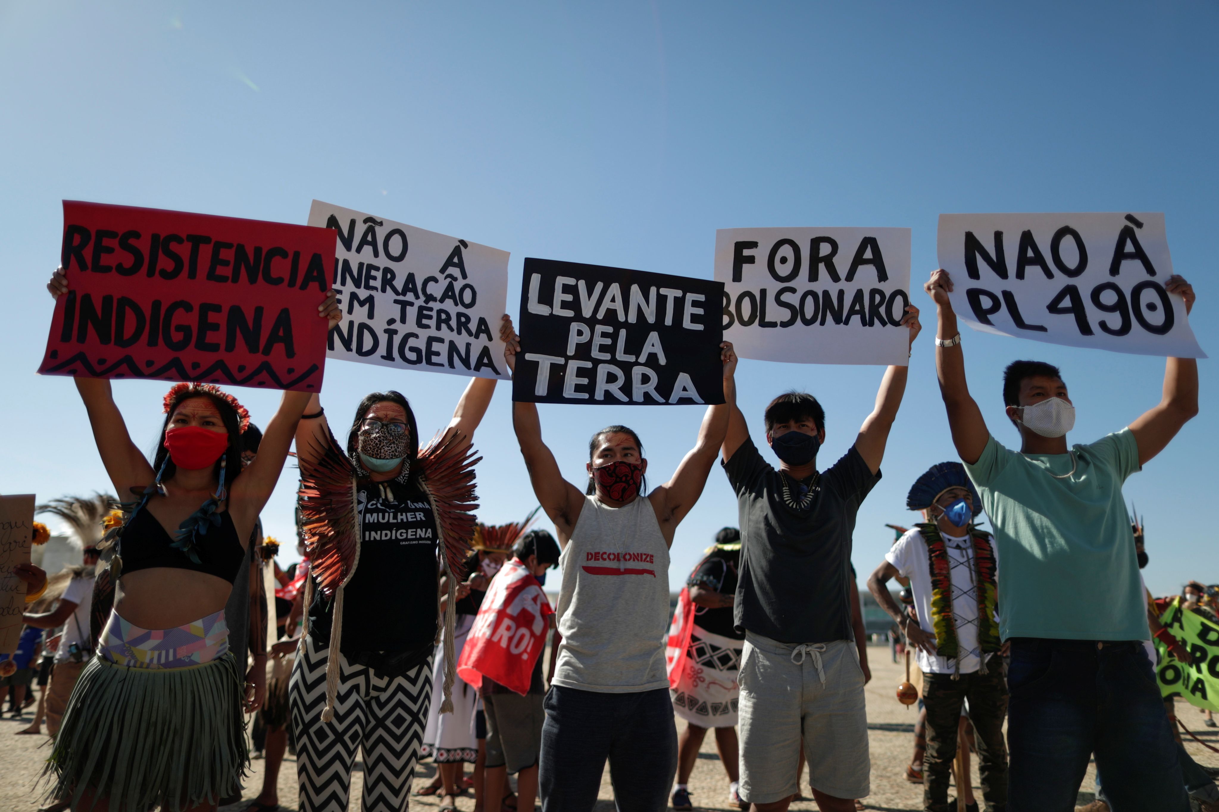 Indigenous people at a protest for land rights and against Bolsonaro